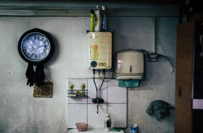 Water heater unit mounted on a wall